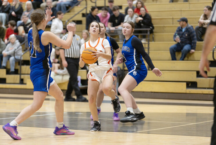 Lady Tigers rally past Lady Bucs
